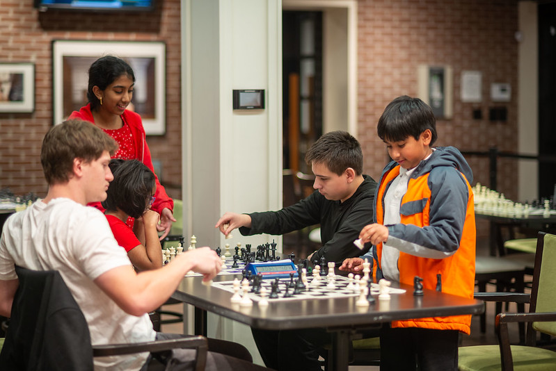 Kids and Adults Playing Chess